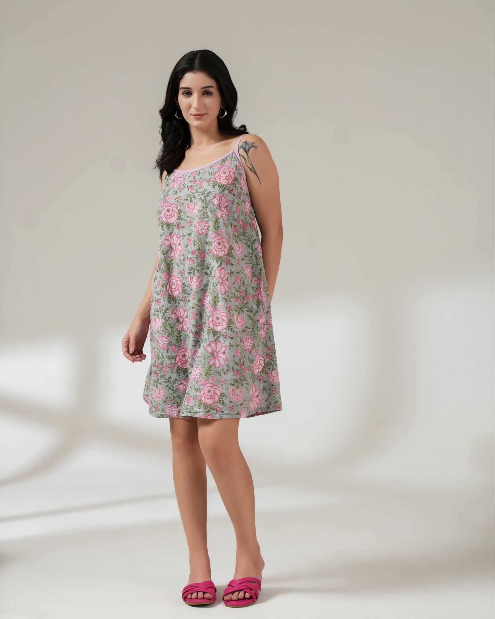 Woman wearing a floral dress on a white background